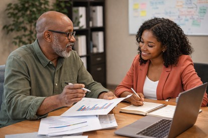 Entrepreneur receiving mentorship and business guidance during a small business support session